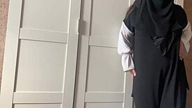 a syrian girl in hijab, wearing pink panties, reveals her intimate holes in a private moment