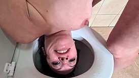 Petite woman enjoys toilet humiliation and wet mess