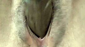 Intensely stroking hairy pussy solo with big black cock until cum