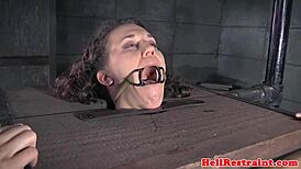 This restrained BDSM sub is punished with bastinado, spanking, and toys in the garage!