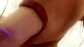 Why does this slutty girl with big boobs tease with a huge dildo?