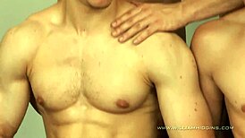 Gym orgy erupts with bareback group action among four sweaty guys.