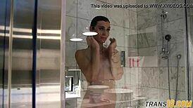 smalltitted tranny showering under the camera's gaze