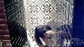 spying on a pink anus through hidden cam in a dirty toilet setup.