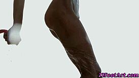 Petite babe performs footjob