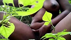 i watch this tribal african ebony fingering her pussy with toys in the woods for masturbation
