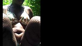 Watch this masked girl masturbating outdoors, she's so horny