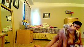 Young friends kiss in group setting