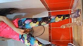 pee and close-up dildo masturbation in the gym shower