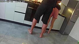 Cheating wife sneaks a hard fuck with neighbor in steamy kitchen
