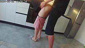 Cheating wife sneaks a hard fuck with neighbor in steamy kitchen