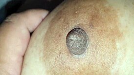 Squeezing My Step Nipples While Sucking On Big Tits