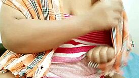 Myanmar aunty shows her big tits to me.