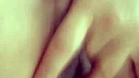 Wow, this sexy petite morena masturbates her wet hairy pussy on the bed!