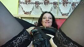 Curvy MILF in Dominatrix Uniform Teases with Foot Fetish. She Masturbates Using Heels in Amateur Pawg Style.