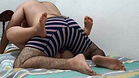 Couple Shares Intimate Moment in Parents' Bedroom