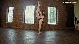 Rita Pervorazova flexes nude in gym