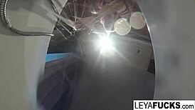 Leya Falcon teases her ass with the tub shower head, nude and wet in the pool, blonde babe masturbating solo.