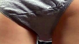 Blonde girl pees in her panties while alone at home