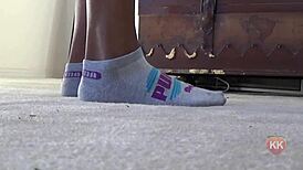 Ebony Cougar Worships Puma Socks in Intense Fetish Play
