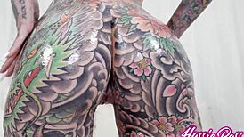 she rocks tattoos of tigerlilly while gagging on damion dayski's cock