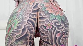 she rocks tattoos of tigerlilly while gagging on damion dayski's cock