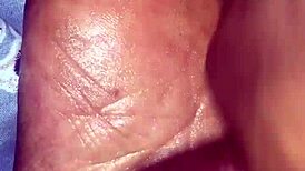 Girlfriend gives detailed footjob with her feet on his cock