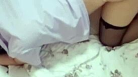 This sexy asian babe in black stockings looks so tempting.