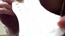 she removes pads and pisses with hairy pussy