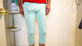 Dude Teases Hard Cock In Leggings While Flashing Pre-Cum