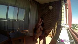 Spanish lass gets off in public balcony display
