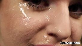 frisky doll gets a huge cumshot on her face, eatin all that semen, damn