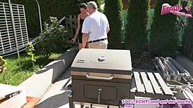 German amateur MILF with big tits fucks ugly old grandpa in public.