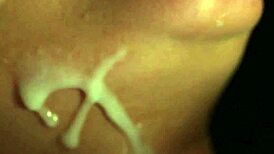 frisky doll gets a huge cumshot on her face, eatin all that semen, damn