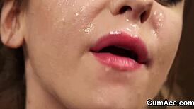 frisky doll gets a huge cumshot on her face, eatin all that semen, damn