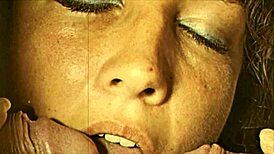 Vintage scene with one mouth handling two hard cocks