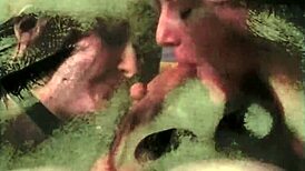 Vintage scene with one mouth handling two hard cocks