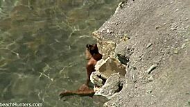 Yo, beach couple getting it on again! So hot! 🏖️