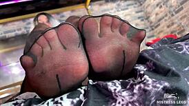 Goddess feet tease in cute black pantyhose up close