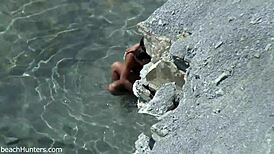 Yo, beach couple getting it on again! So hot! 🏖️
