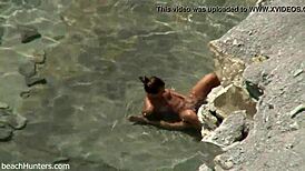 Yo, beach couple getting it on again! So hot! 🏖️