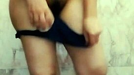 Step cousin relaxes in bathroom