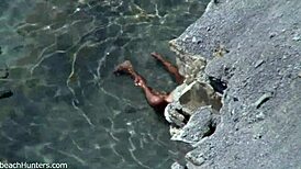 Yo, beach couple getting it on again! So hot! 🏖️