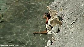 Yo, beach couple getting it on again! So hot! 🏖️