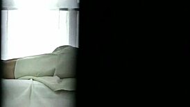 Relaxing oiled massage for a vibrant redhead in a serene spa setting