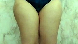 Chubby Indian woman with big natural tits masturbates in bathroom, begging for fuck.