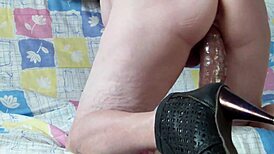 Amateur Wife Struggles With Huge Dildo On Sofa