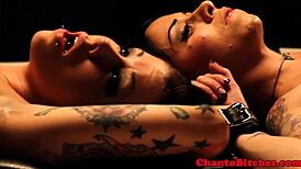 Lezdom Mistress Oversees Submissive Participants