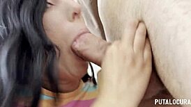 Beautiful brunette blows two cocks in a hot trio!