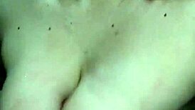 Sucking his dick with big tits